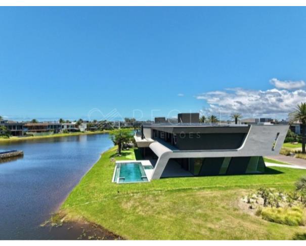 Foto de LOTE A44 - CONDOMÍNIO ENSEADA LAGOS DE XANGRI-LÁ